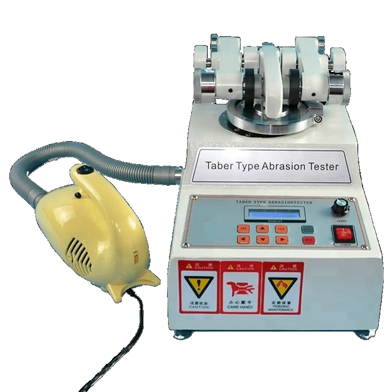 Tabor Type Abrasion Tester with accessories on a white background