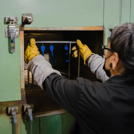 A woman using an heat again machine