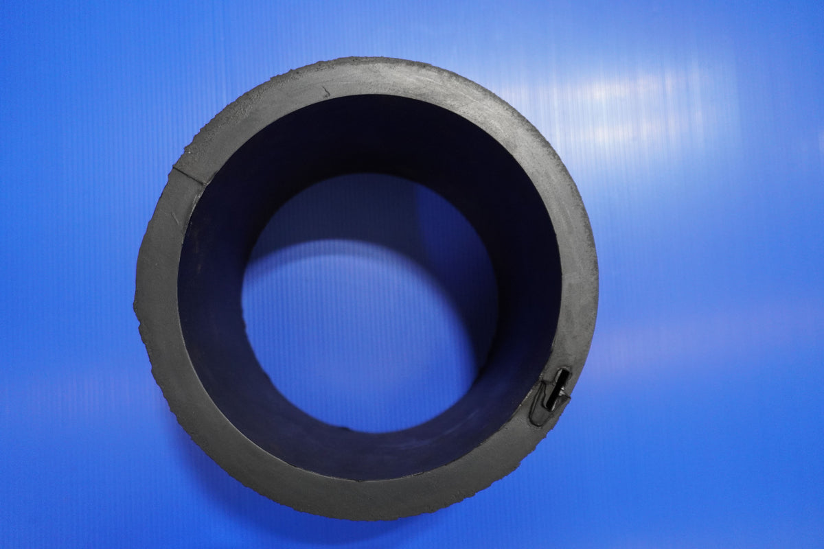 Black neoprene rubber on a blue background